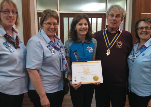 Photograph shows L-R Di Gough (Ranger Leader) Dawn Clutton (District Commisioner) Sylvie Ward, Neil Chisolm (President, Warwick Lions) Debbie Warden (County Commisioner).