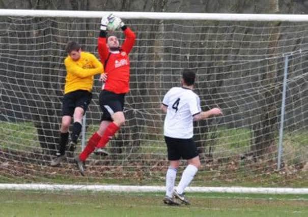Whitnash keeper Neil Stacey went from villain to hero.