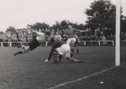 Bill Draper scored a diving header for AP Lockheed Leamington.