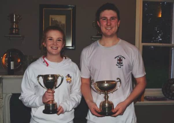 Felicity Sargent and her brother Tom Lewis celebrating at Moreton Morrell Club after she had won the clubs handicap championship and he had taken the open singles title. Picture submitted
