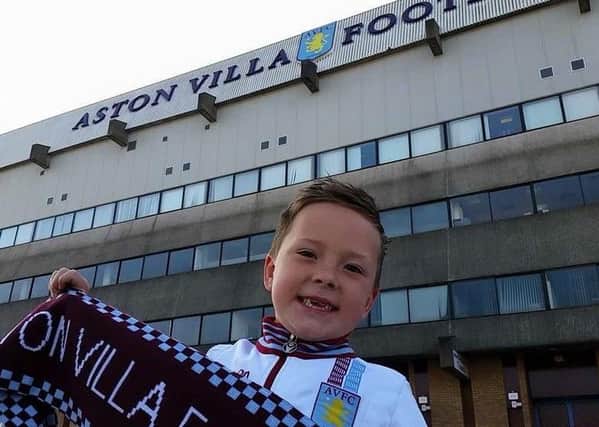 Leamington schoolboy Charlie Pye, who applied for the Aston Villa manager's job before he was 'just pipped' by new boss Tim Sherwood. Pictured outside Villa Park. 7Usj6k0WshG9zLd0bKaW