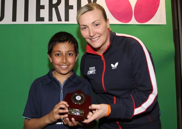 Kelly Sibley was on hand to cast her eye over the up-and-coming talent at the National Schools Championships as well as support the eight players from Lillington Free Church. Here she is presenting the under-11 boys winners trophy to Amirul Hussain of Oldham. Picture submitted