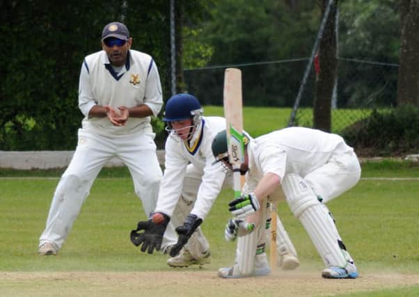 Wardens wicketkeeper Nick Sale reacts quickly to dismiss Kidderminsters Connor Smith off the bowling of Matt Hancock. Picture: Morris Troughton