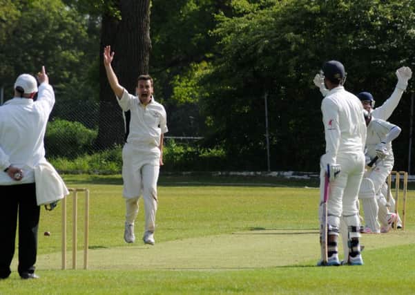 Wardens 2nd XI bowler Chris Baynes claims the wicket of Walsalls Qadoos Rashid without scoring. Picture: Morris Troughton