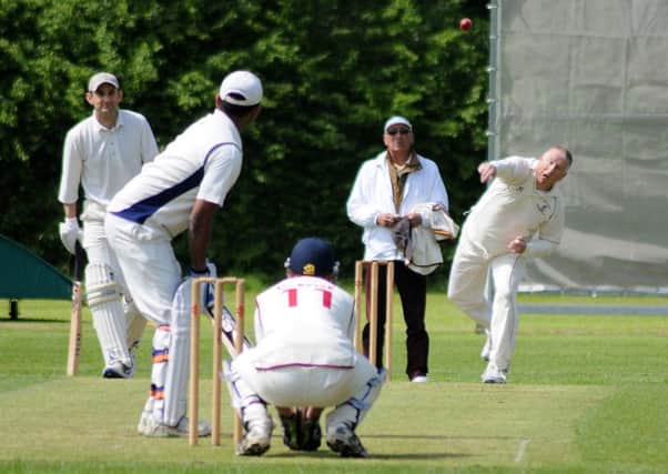 Warwickshire County Council Staffs Duncan Gardner bowls to Leek Woottons Sandeep Murthy. Picture: Morris Troughton