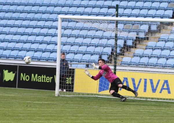 Coventry Copsewood keeper Dale ODonnell guesses the right way to keep out Tunde Ajibades first-half penalty. Pictures: Covsupport News Service/Steve Barnett