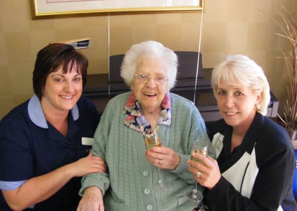 Alice Wilkins celebartes her 100th birthday at Cubbington Mill Care Home with nurse Samantha Atkins and manager Glynis Sheasby.