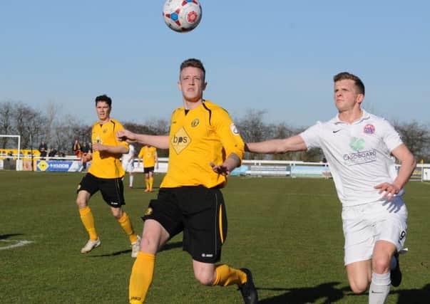 Jamie Tank in action against AFC Fylde.