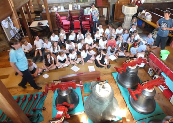 Children from All Saint's Primary School with the bells.