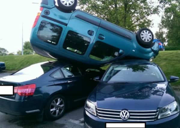 A woman was charged with drink driving after she flipped her car on to two others in a Northamptonshire pub car park