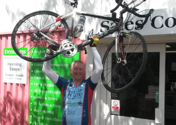Colin Hall, brnahc manager of Denman's Electrical in Leamington, completed a 287-mile cycle ride visiting all of the company's branches in the South and South West Midlands and raised more than £1,400 for Help for Heroes.