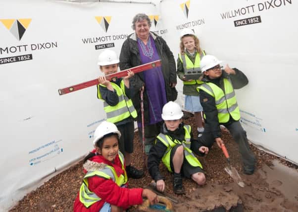 Kate Sayer with pupils from St Patrick's Primary School at the Sayer Court site.