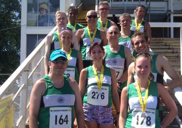 Kenilworth Runners show off their medals after the Pitchcroft 10k.