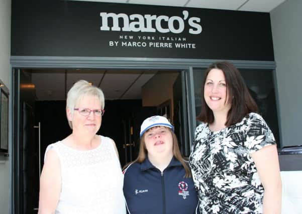 Katie Smith, centre, with her mum Lynne and Louise Sheepy, deputy general manager at Marco's New York Italian.