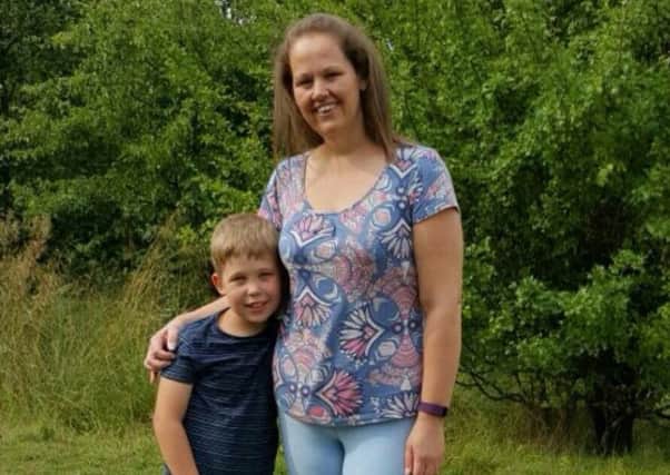 Laura Parkinson after her weight loss with her son, Liam