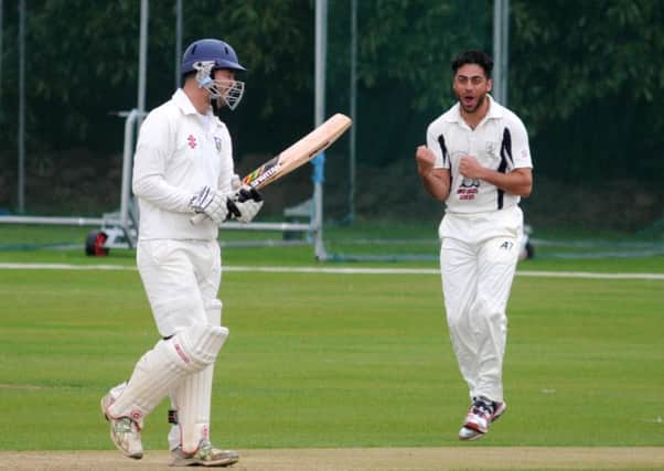 A Smethwick fielder shows his delight after the dismissal of Leamington's Jamie Marsh.