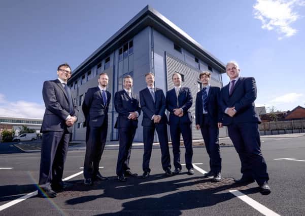 Representatives from the companies that helped build the engineering complex. From left to right: Mark Miller, James Drew, Tom Bromwich, Des Wynne, Michael Hiscock, John Vickery, and Martin Gallagher