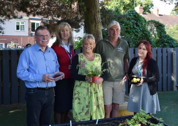 Trust Director of Development with Sustainability Lead Abbey Morris and partners who have helped create the garden.