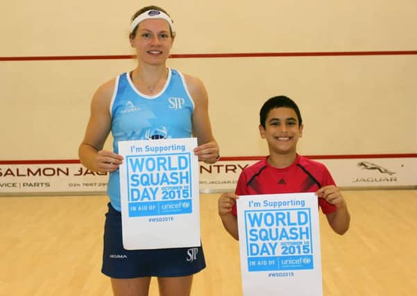 World number 12 Sarah-Jane Perry publicises Word Squash Day with fellow Kenilworth player and national under-11 champion  Abd-Allah Eissa. Picture submitted