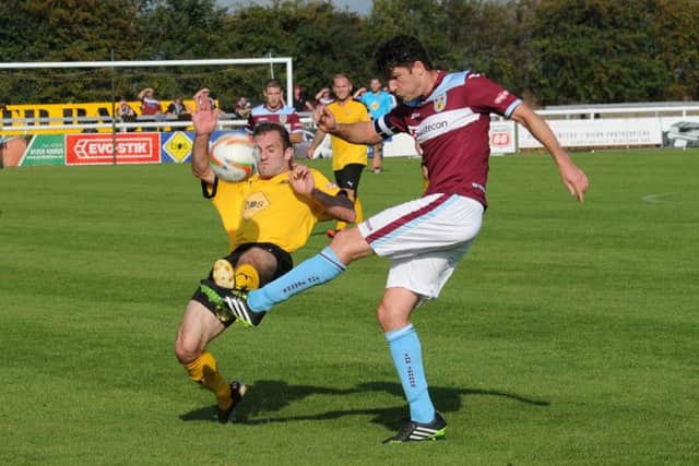 Lee Chilton shows the kind of tenacity which makes him such a crucial part of Paul Holleran's promotion-chasing side.