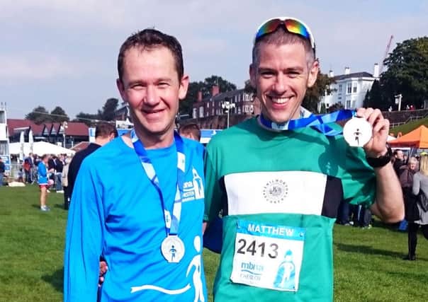 Kenilworth Runners Stuart Hopkins and Matthew Kingston-Lee show off their medals at Chester.