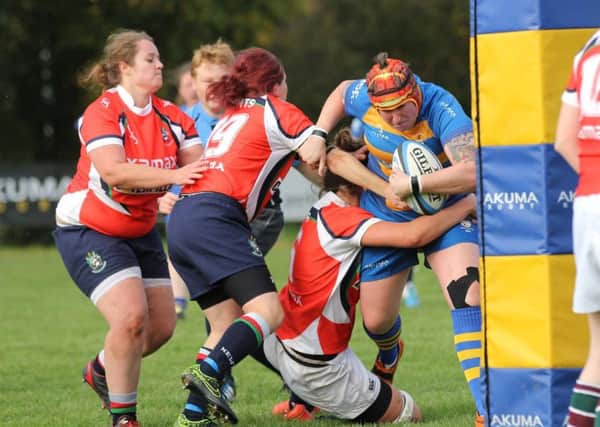 Dulcie Hardwick bulldozes her way over for a debut try for Old Leamingtonians Ladies. Picture: Tim Nunan