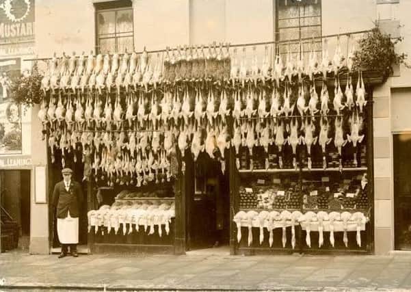 A Christmas display at Metcalf's Game and Poultry shop on Clemens Street, c.1910.