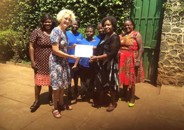 Sharon Maxted with fellow Soroptimists from Malawi