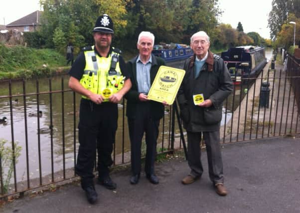 Canal Watch launch: PC Rob DAVIES of Warwickshire Police with Reg Smith And and Peter Bailey of Mid-Warwickshire Neighbourhood Watch.