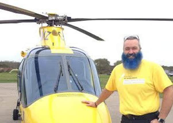 Steve Adams, who has grown a beard to raise funds for the Warwickshire and Northamptonshire Air Ambulance.