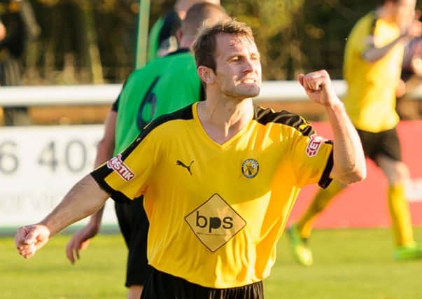 Lee Chilton celebrates his opening goal against Barwell. Picture: Mike Baker