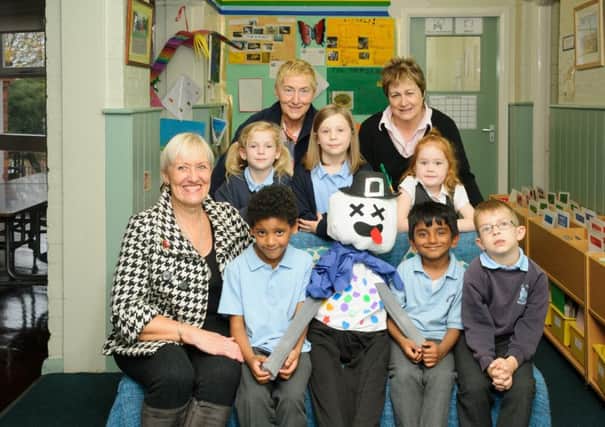 Warwick Bonfire Committee visited schools to see the Guys made by  pupils. 

Pictured: Committe Members - Cllr Christine Cross (Deputy Mayor), Jackie Crapmpton (Warwick Town Bonfire Commitee), Ann Cannings (Event Sponsor - The Tuckery), and pupils from Westgate School. NNL-150311-214138009