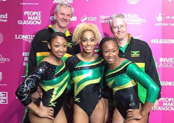 Danusia Francis, centre, with coaches Vince Walduck and Justin Howell and Jamaica team-mates  Maya Williams and Toni Anne Williams.
