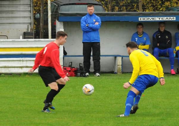 Southam United manager Lee Constable, centre, oversaw his seventh successive loss in midweek.