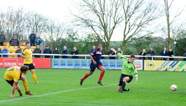 Cirencester keeper Glyn Garner is unable to keep out Joe Halsall's debut strike for Leamington. Picture: Mike Baker