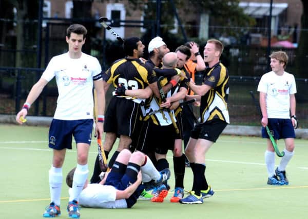 Khalsa celebrate another Aaron Nagra short corner goal on their way to victory over Bournville. Picture: Jass Lall