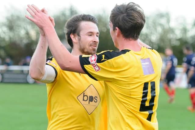 Ross Oulton congratulates Joe Halsall on his opener against Cirencester. Picture: Mike Baker