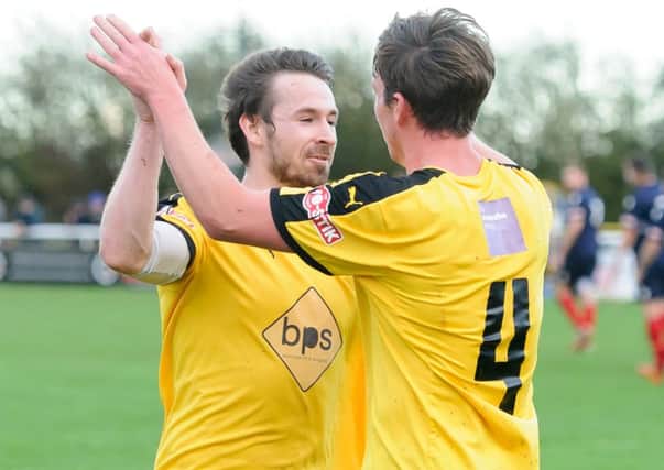 Ross Oulton congratulates Joe Halsall on his opener against Cirencester. Picture: Mike Baker