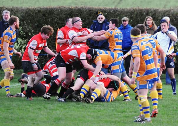 Tempers boil over during Saturday's derby between Harbury and Old Leamingtonians. Picture: Morris Troughton