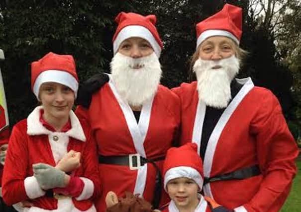 Rachel Stinton with her family are taking part in the Myton Hospices' Santa Dash.