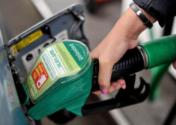 Refuelling at an Asda petrol station (diesel, fuel)