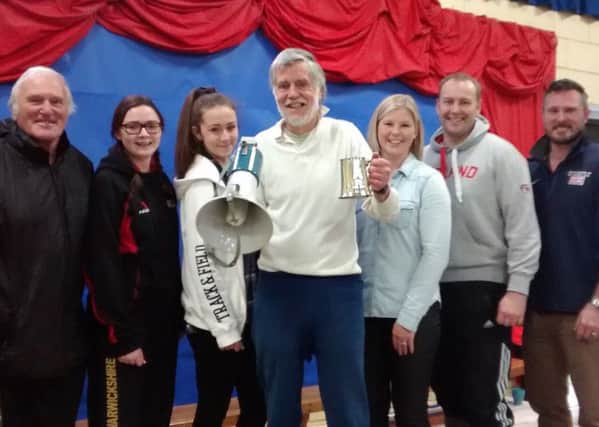 Pete Guppy was presented with a tankard by former runner sin the Mid-Warwickshire Primary Schools Cross Country League, including Sara Wills (McGreavy). Picture: Morris Troughton