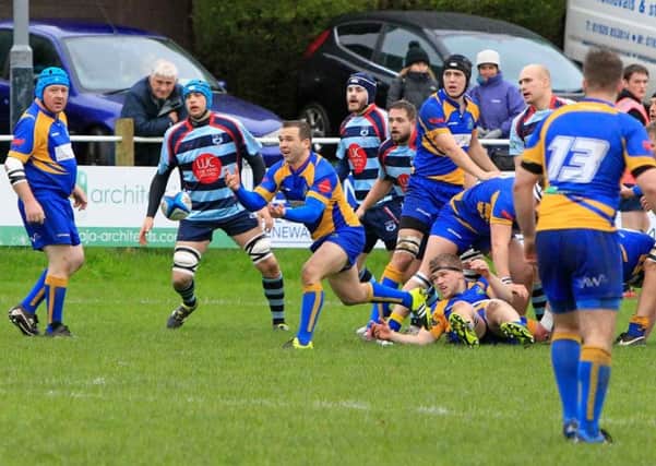 Gareth Renowden spreads play from the back of the scrum. Picture submitted