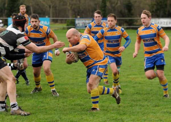 Craig Ellis on the charge for Old Leamingtonians at home to Ledbury. Picture: Morris Troughton