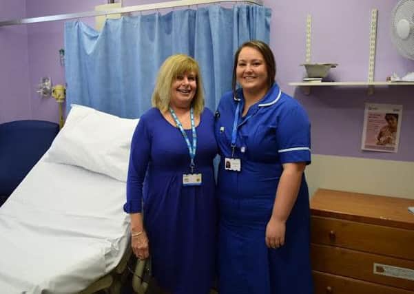 Rosie Harris and Shannon Cassidy in the room at Warwick Hospital where Shannon was born.