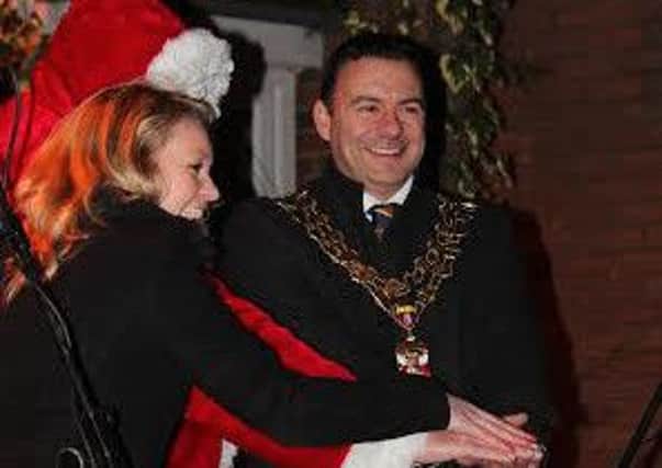 Southam mayor Cllr Jason Ward, his wife Michelle and Santa switching on the town's Christmas lights.