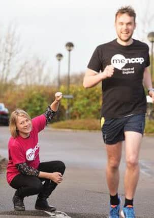 Will Carr in training for the London Marathon, cheered on by Cath Errington, fundraising manager for Heart of England Mencap.