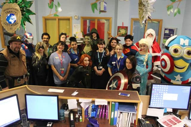 Cosplayers with staff at Warwick Hospital