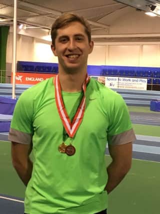 James Wright with his medals in Sheffield
