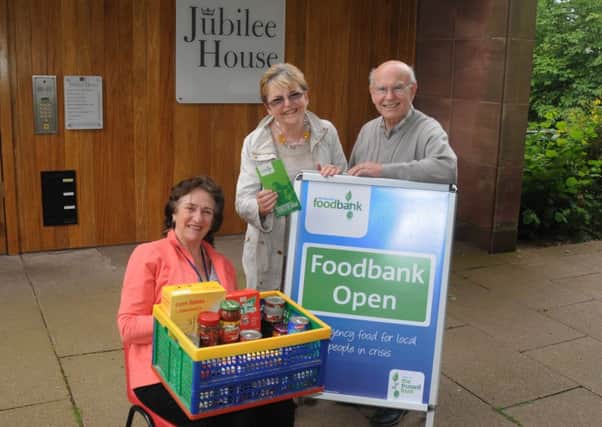 Yvonne Wheeler (Project Manager), Nessa Kerby (Treasurer) and Les Thornton (Store Manager)  outside Jubilee House where the Foodbank will be located. Mhlc-01-08-12 Foodbank aug7 ENGNNL00120120108134647